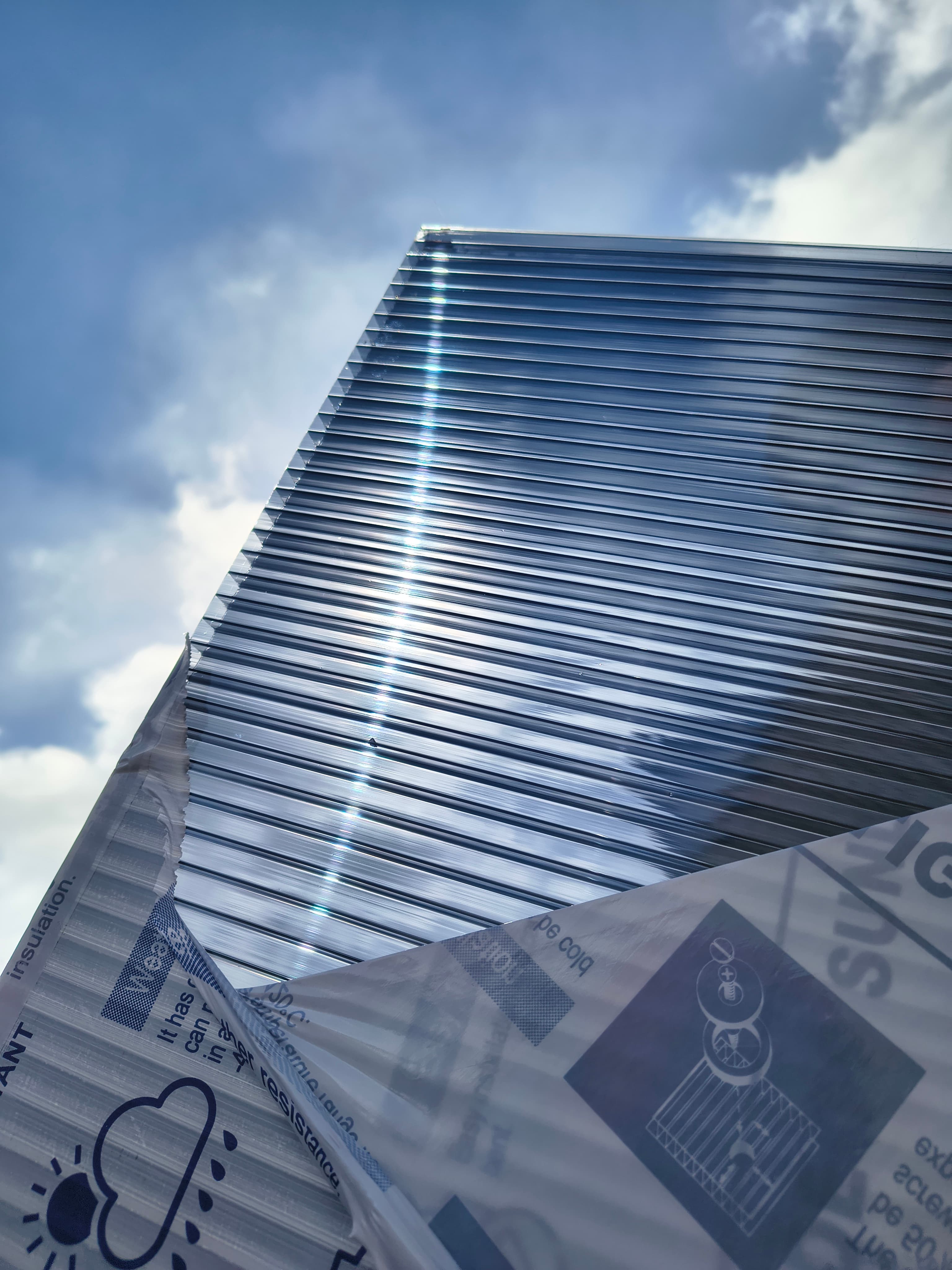 Twinwall polycarbonate sheet showing ribbed structure against sky